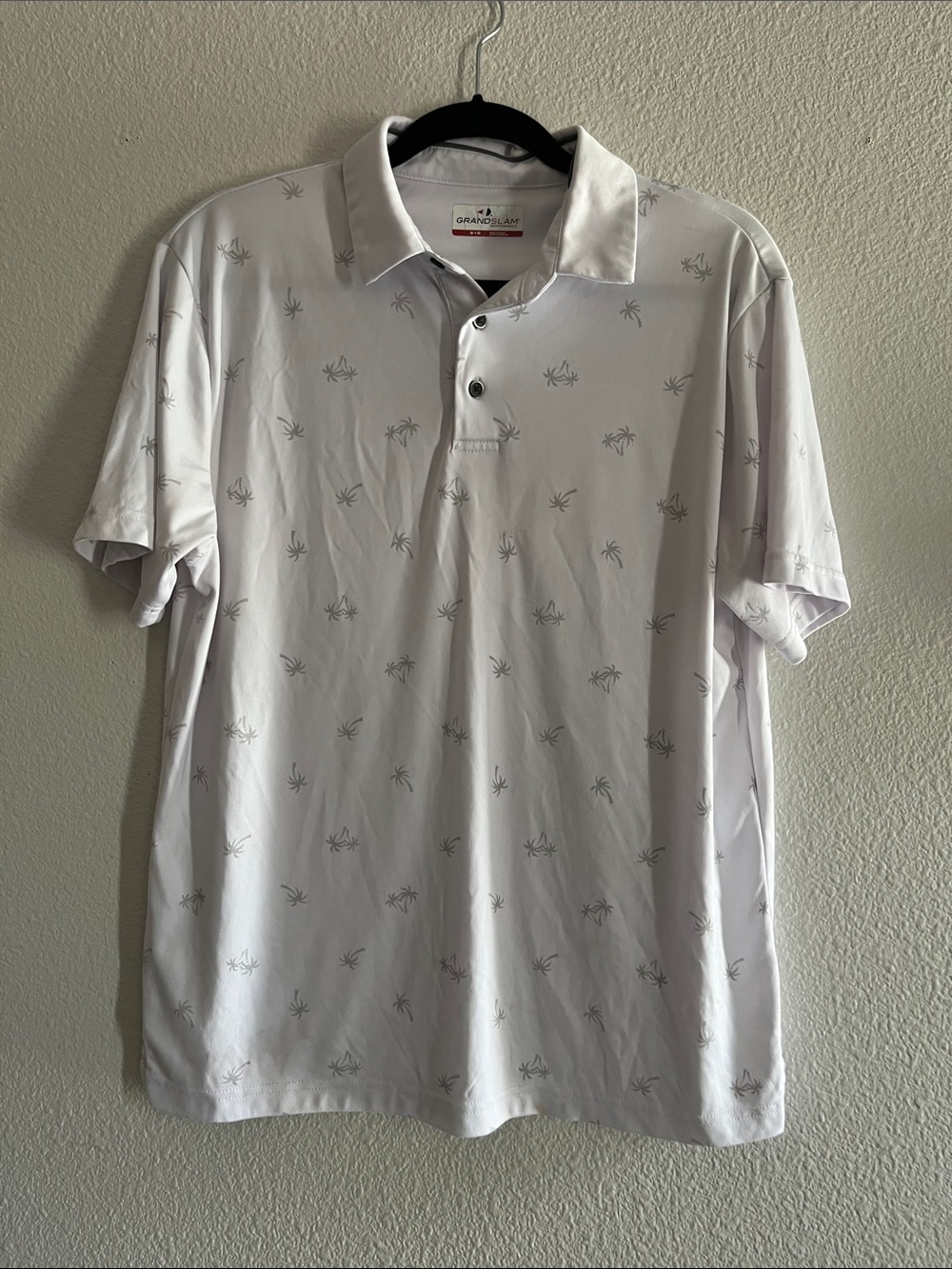 Grand Slam White Polo with Subtle Palm Motif